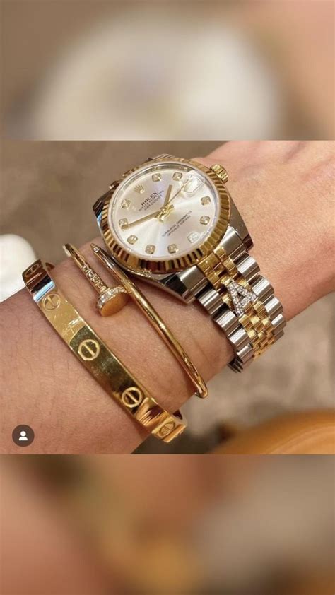 cartier or rolex watch